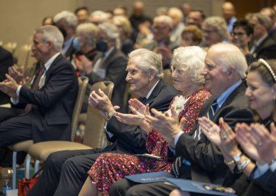Judge J. Clifford Wallace and his wife, Jenee, clap during the cermeony.